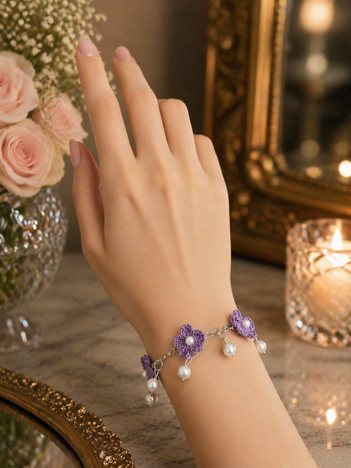 Lavender crochet charm bracelet with pearl drop detailing on wrist