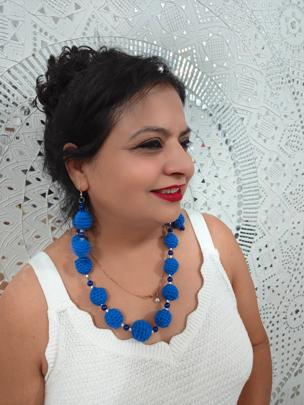 Royal blue handmade crochet statement jewelry set styled for festive wear