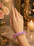 Boho Raga pink bloom crochet bangle bracelet with pink and purple bead detailing