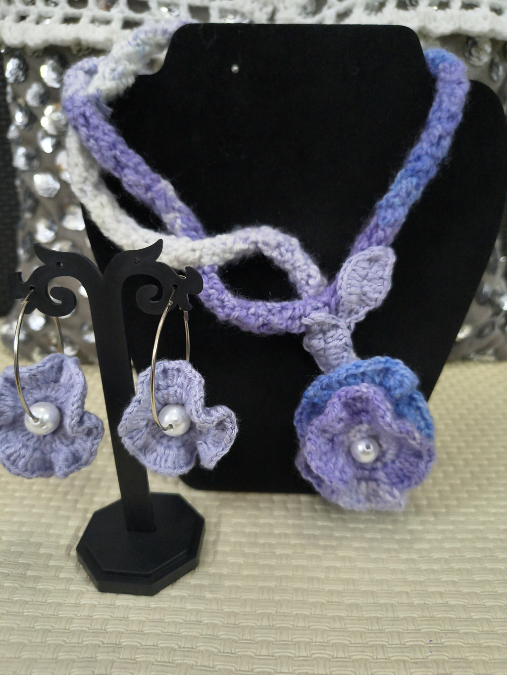 Periwinkle Bloom crochet necklace set with floral design and matching earrings