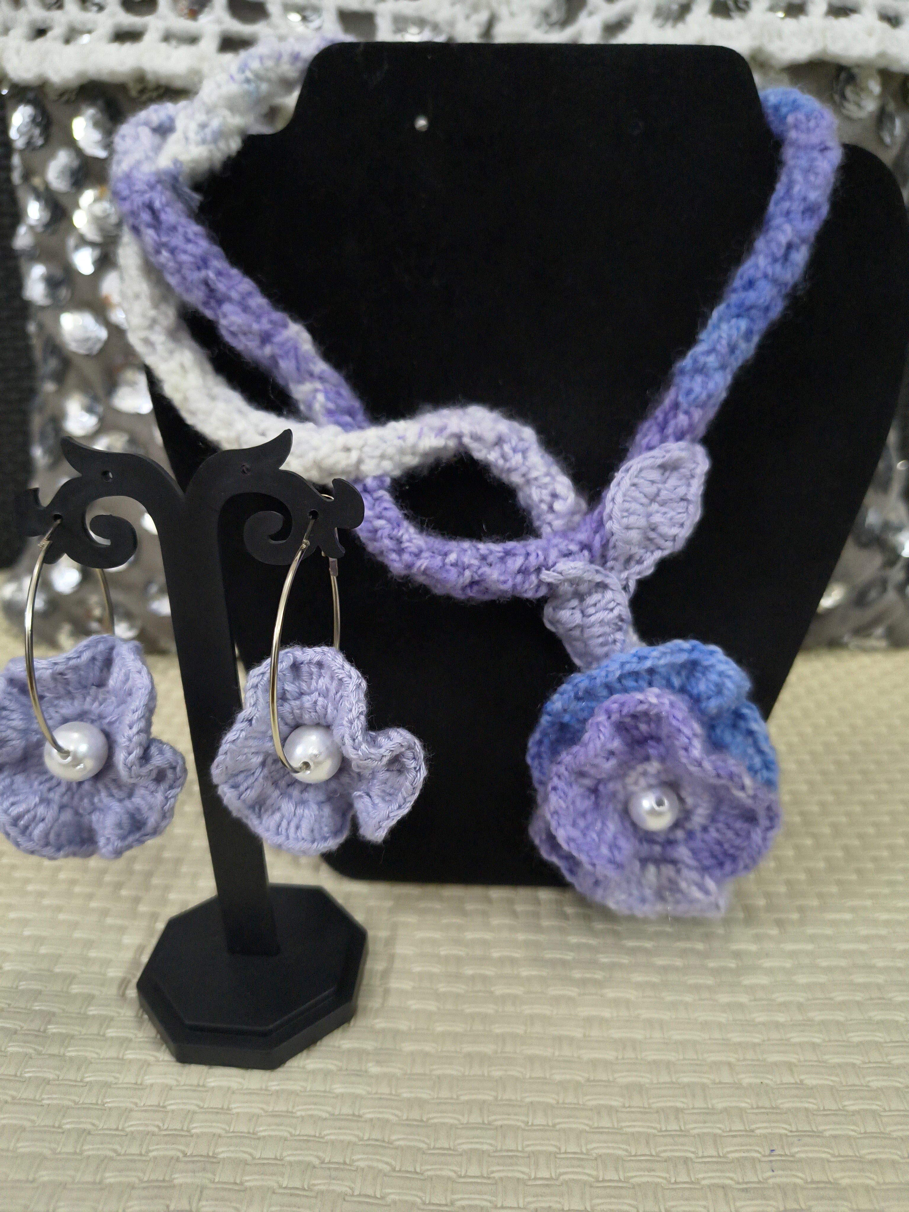 Periwinkle Bloom crochet necklace set with floral design and matching earrings