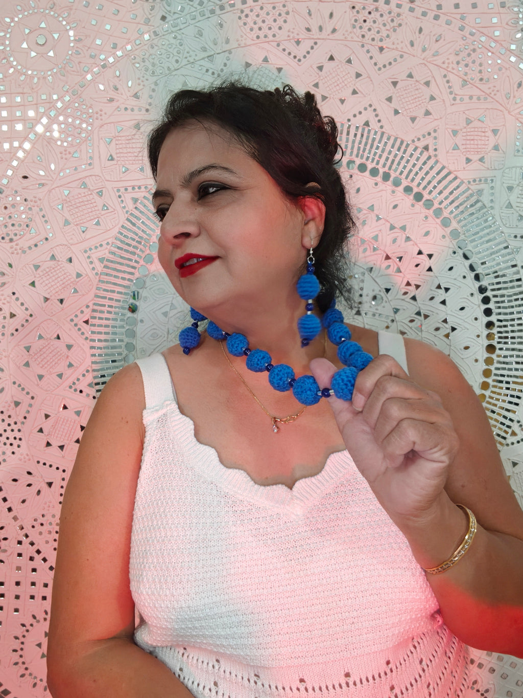 Handmade blue crochet earrings matching necklace set