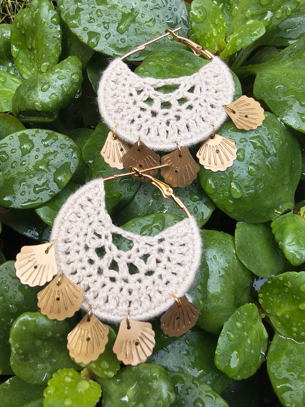 Crochet earrings with golden shell accents